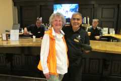 Carolyn Wilczynski and bartender